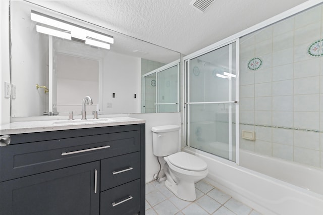 bathroom with visible vents, toilet, a textured ceiling, shower / bath combination with glass door, and vanity