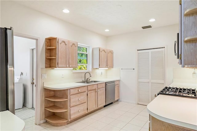 kitchen with visible vents, open shelves, light brown cabinetry, a sink, and appliances with stainless steel finishes