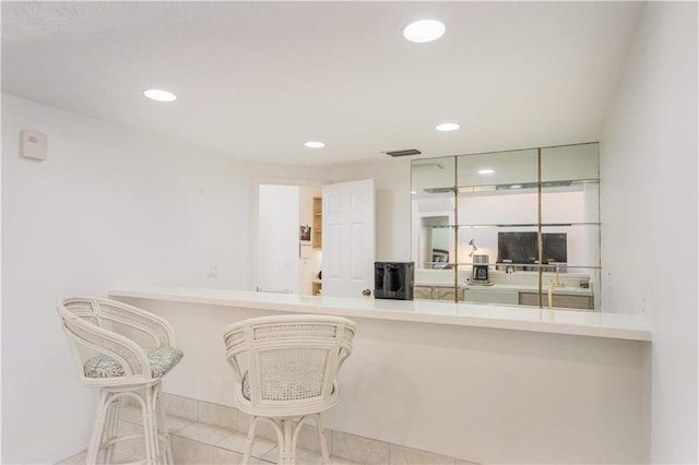 kitchen featuring recessed lighting, visible vents, and tile patterned flooring