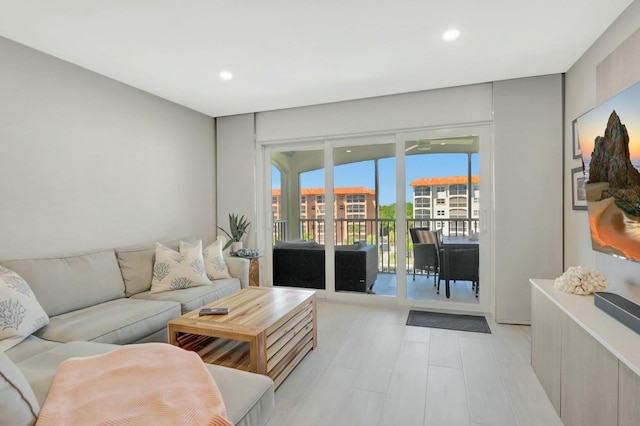 living room featuring recessed lighting