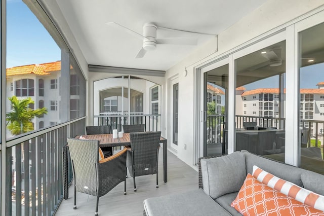 balcony featuring a ceiling fan