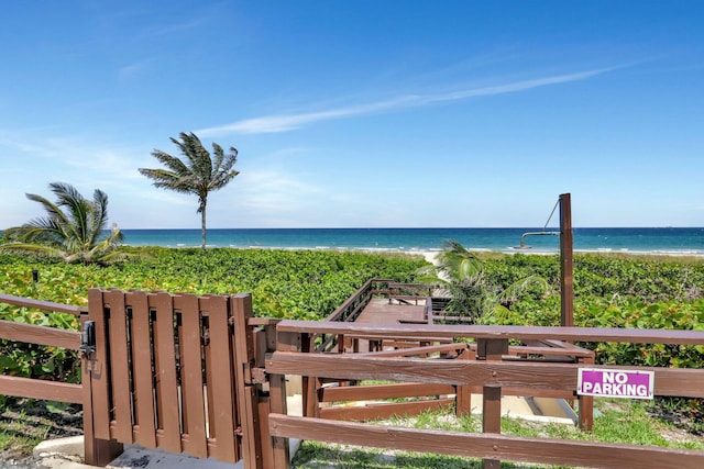 property view of water featuring a beach view