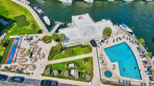 birds eye view of property featuring a water view