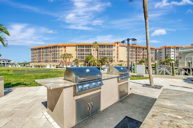 view of patio / terrace featuring exterior kitchen and area for grilling