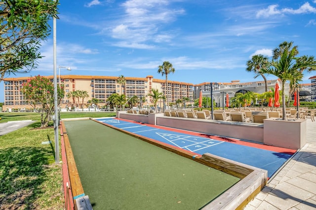 view of community featuring shuffleboard