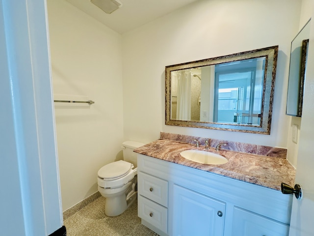 230 Normandy Ln E, Delray Beach, FL 33484 - bathroom featuring baseboards, vanity, and toilet