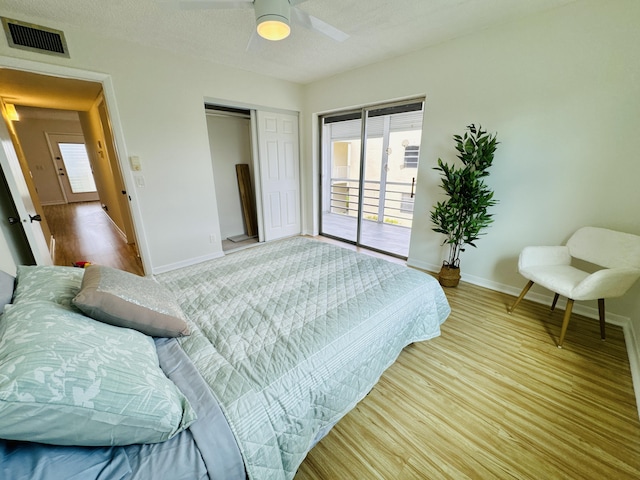 230 Normandy Ln E, Delray Beach, FL 33484 - bedroom featuring access to outside, baseboards, a closet, wood finished floors, and a ceiling fan