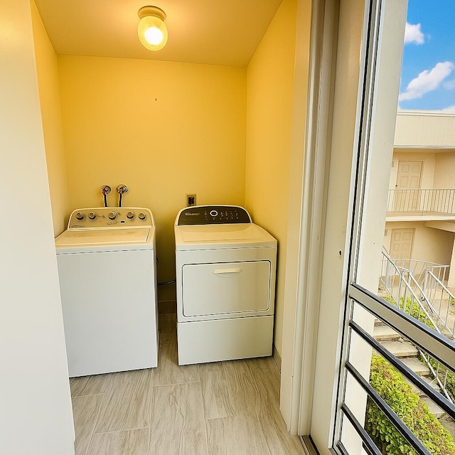 230 Normandy Ln E, Delray Beach, FL 33484 - laundry room featuring washing machine and clothes dryer