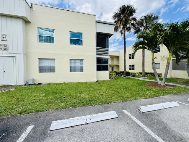 230 Normandy Ln E, Delray Beach, FL 33484 - view of property with uncovered parking