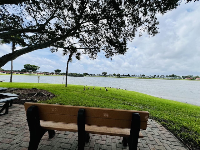 230 Normandy Ln E, Delray Beach, FL 33484 - view of patio / terrace featuring a water view