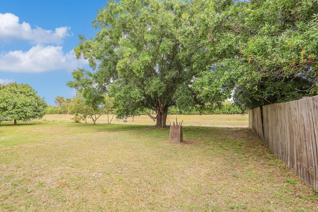 view of yard with fence