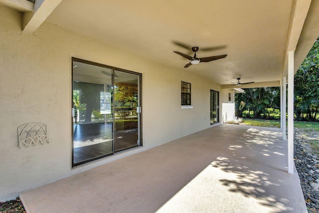 view of patio featuring ceiling fan