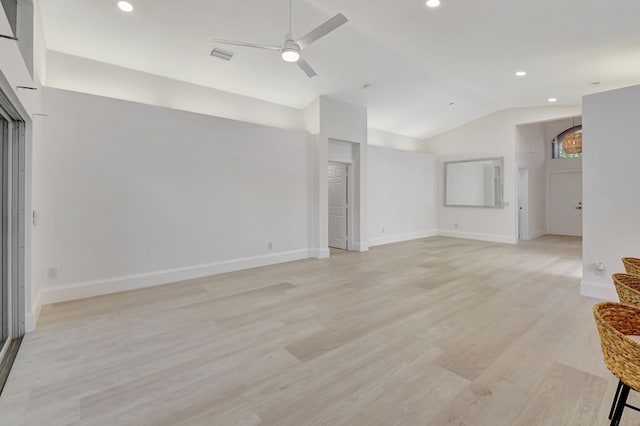 11287 Vivero Ave, Boynton Beach, FL 33437 - unfurnished living room with light wood-type flooring, ceiling fan, vaulted ceiling, and recessed lighting