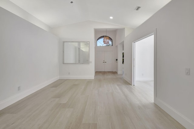 11287 Vivero Ave, Boynton Beach, FL 33437 - foyer with light wood-style flooring, baseboards, visible vents, and lofted ceiling
