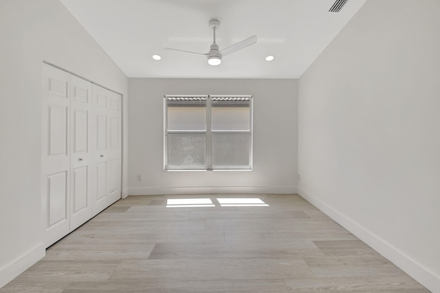 11287 Vivero Ave, Boynton Beach, FL 33437 - unfurnished bedroom with visible vents, baseboards, a closet, and wood finished floors