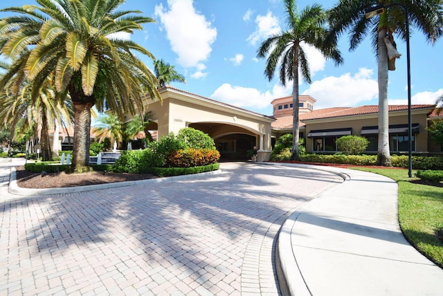 11287 Vivero Ave, Boynton Beach, FL 33437 - view of building exterior with curved driveway
