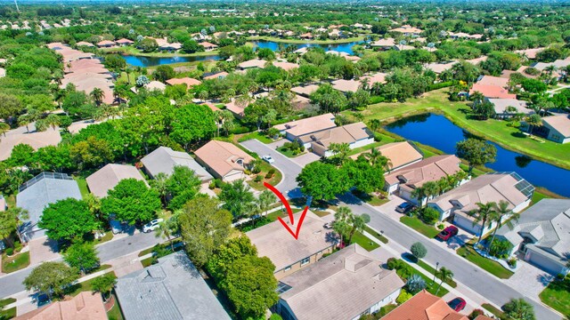 11287 Vivero Ave, Boynton Beach, FL 33437 - drone / aerial view with a residential view and a water view