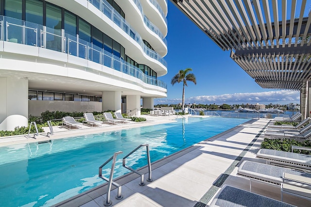 pool with a patio area