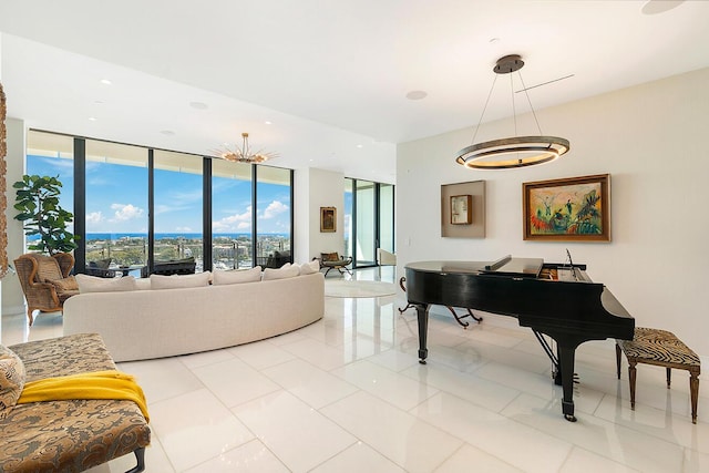 living area featuring light tile patterned flooring and expansive windows