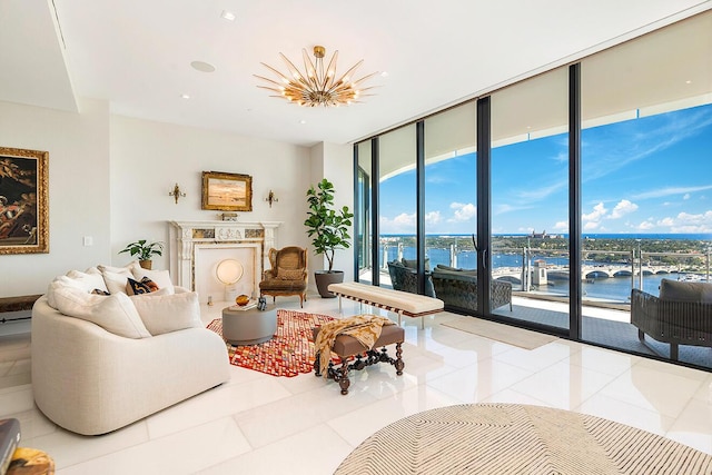 tiled living area with a wall of windows and a water view