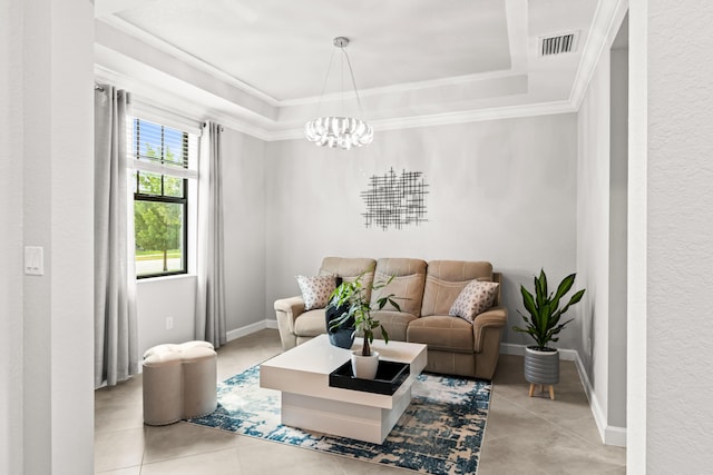 living area featuring a tray ceiling, visible vents, crown molding, and tile patterned flooring