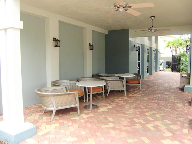 view of patio featuring a ceiling fan