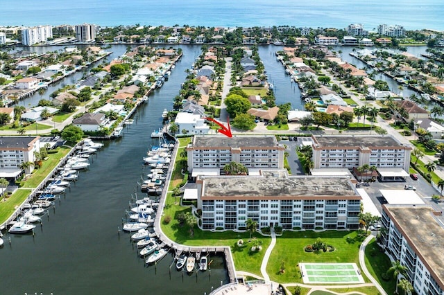 aerial view featuring a view of city and a water view