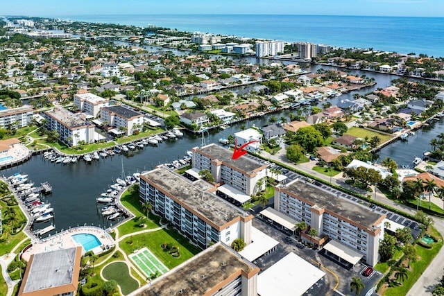 bird's eye view featuring a city view and a water view