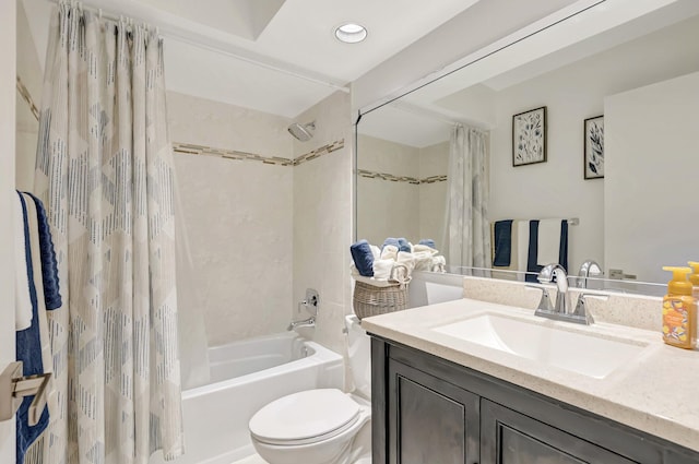 full bathroom featuring vanity, toilet, and shower / tub combo with curtain