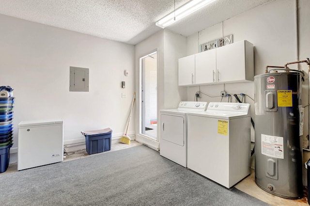 clothes washing area featuring independent washer and dryer, electric panel, a textured ceiling, water heater, and cabinet space