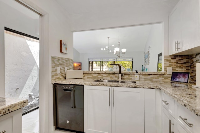 kitchen featuring white cabinetry, black dishwasher, light stone countertops, and a sink