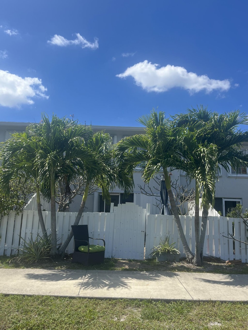 view of home's exterior featuring fence and stucco siding