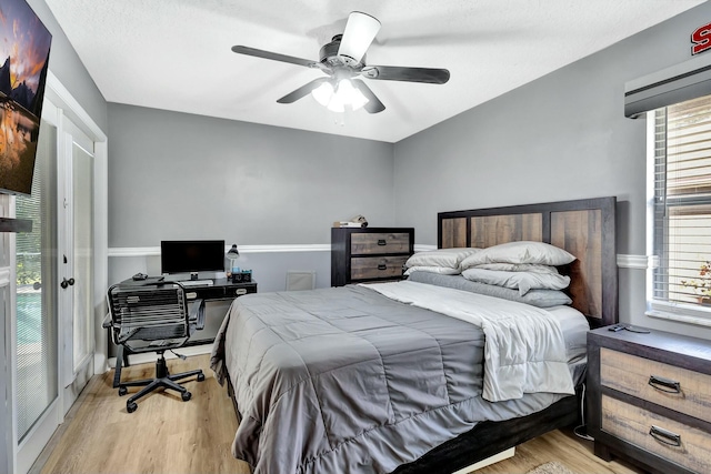 bedroom featuring wood finished floors and a ceiling fan