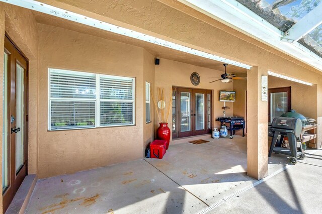 14618 66th St N, Loxahatchee, FL 33470 - view of patio / terrace featuring grilling area, a ceiling fan, and french doors