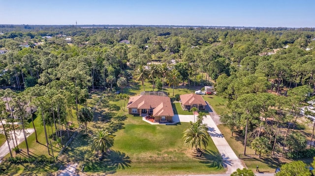 14618 66th St N, Loxahatchee, FL 33470 - birds eye view of property with a forest view