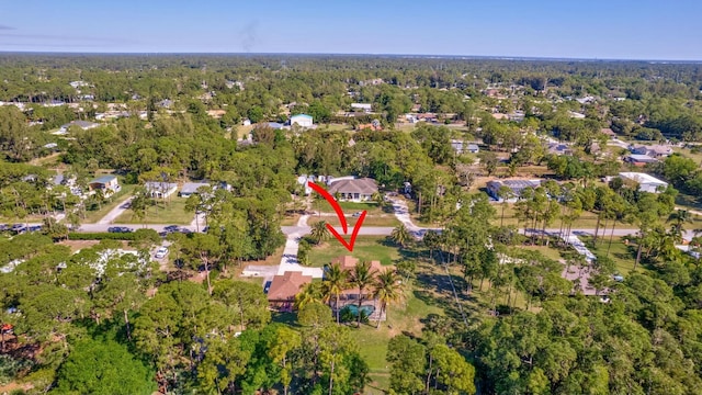 bird's eye view with a view of trees