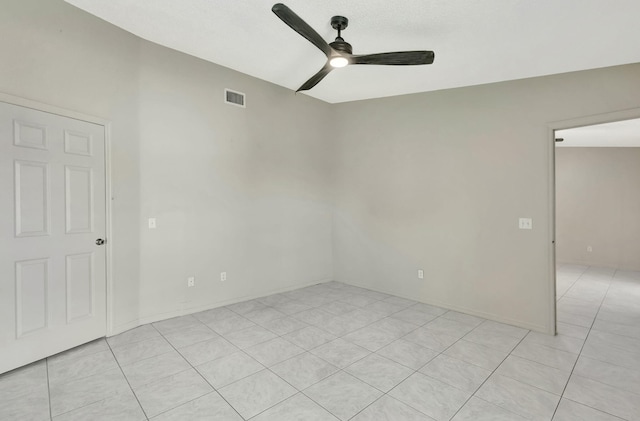 5489 NW Evanston Ave, Port Saint Lucie, FL 34983 - spare room with a ceiling fan and light tile patterned floors