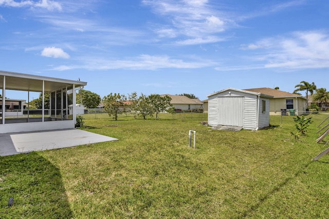 5489 NW Evanston Ave, Port Saint Lucie, FL 34983 - view of yard with a sunroom and a patio area