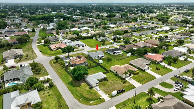 5489 NW Evanston Ave, Port Saint Lucie, FL 34983 - aerial view of property and surrounding area with nearby suburban area