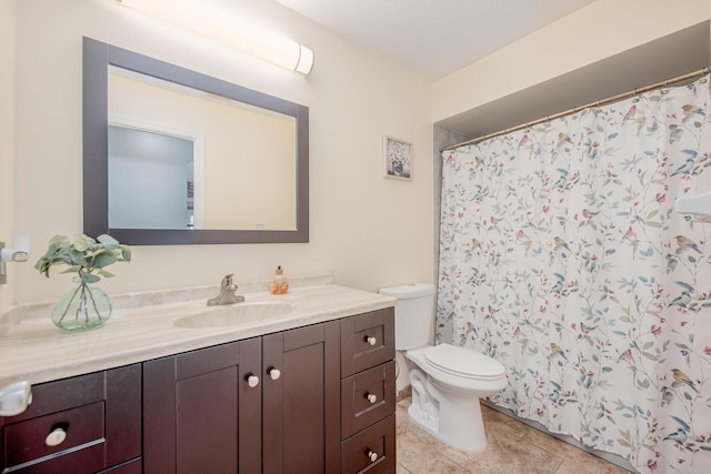 bathroom with tile patterned flooring, toilet, vanity, and a shower with shower curtain