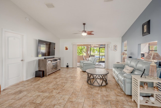 living room featuring baseboards, visible vents, high vaulted ceiling, and ceiling fan