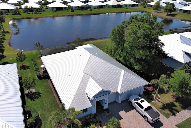 birds eye view of property featuring a residential view and a water view