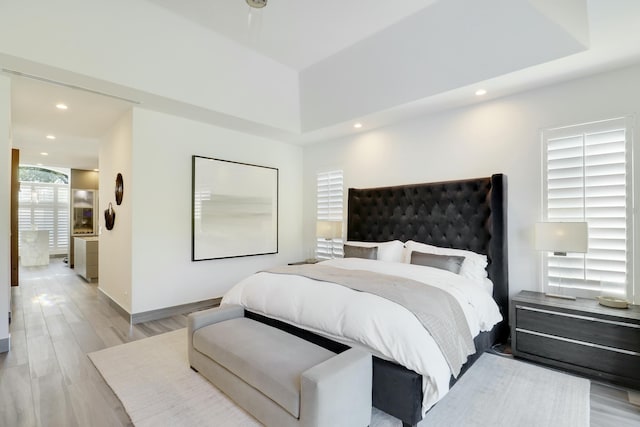 bedroom featuring recessed lighting, baseboards, and light wood-style flooring