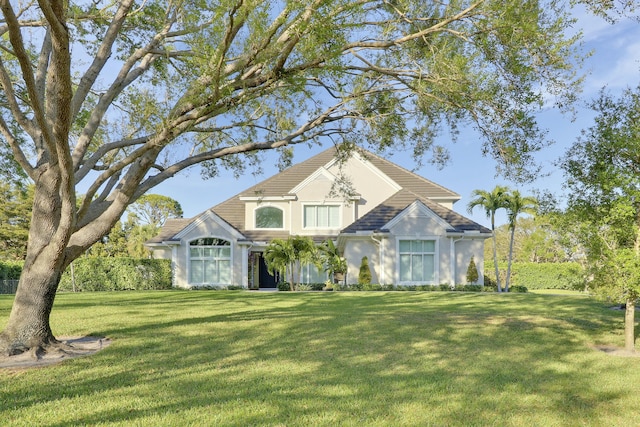 view of front of home with a front yard