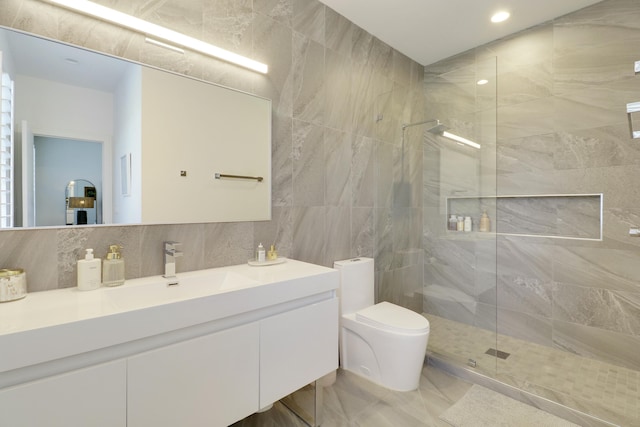 bathroom featuring vanity, walk in shower, tile walls, toilet, and backsplash