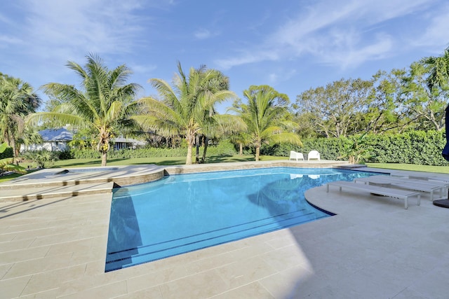 pool with a patio area