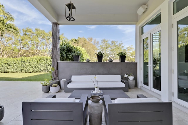 view of patio featuring an outdoor living space and french doors