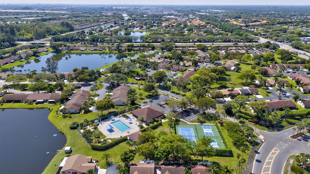 bird's eye view with a residential view and a water view