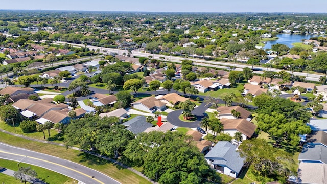 bird's eye view featuring a residential view and a water view