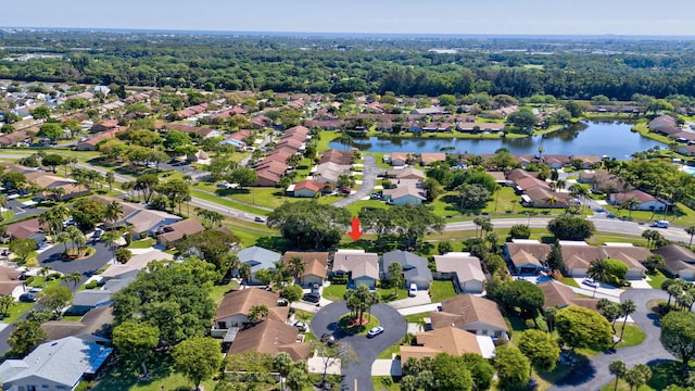 bird's eye view with a residential view and a water view